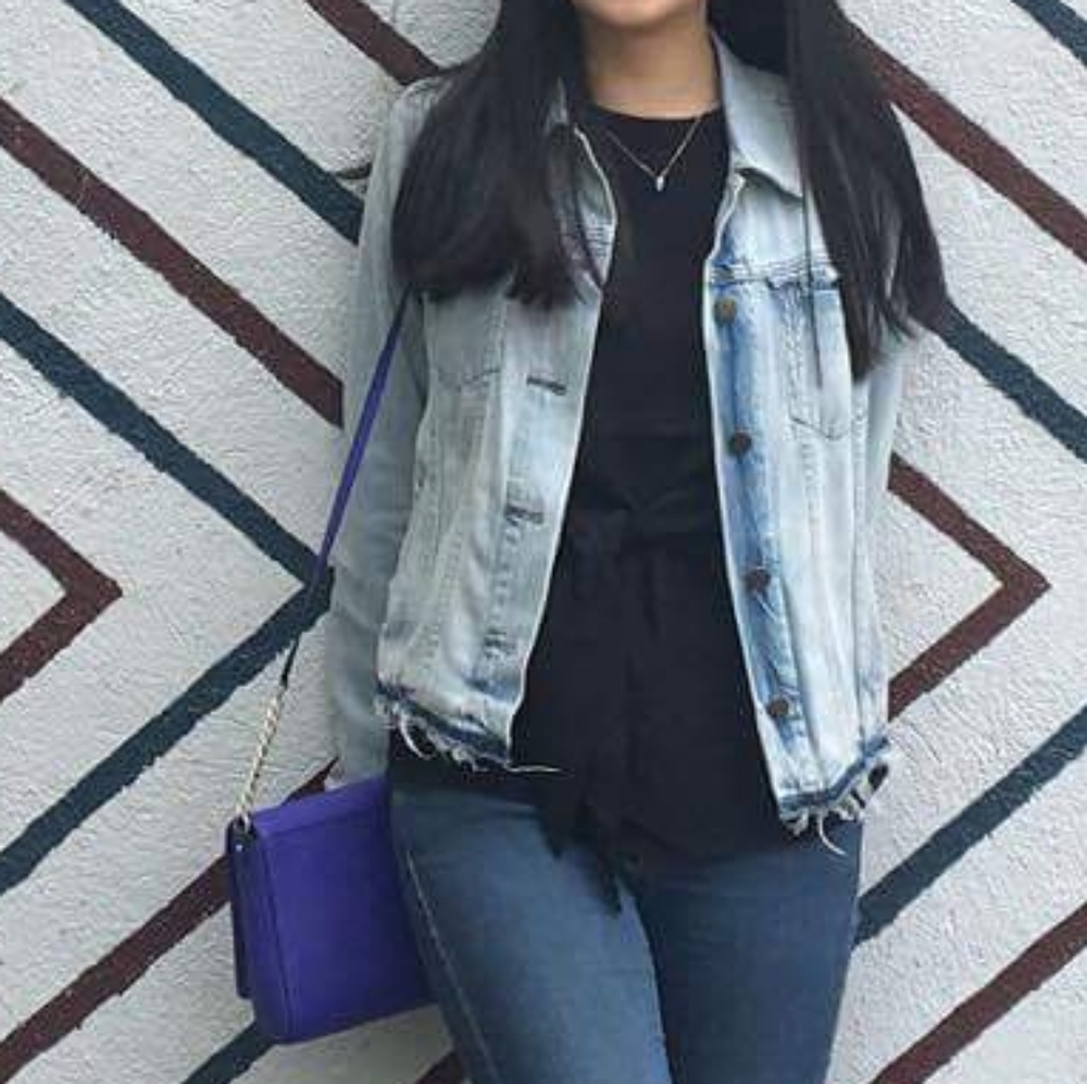 Light wash denim jacket w/ raw hem detail